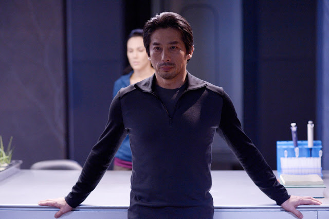 HELIX -- "Level X" Episode 109 -- Pictured: (l-r) Kyra Zagorsky as Dr. Julia Walker, Hiroyuki Sanada as Dr. Hiroshi Hatake -- (Photo by: Philippe Bosse/Syfy)